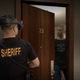 A screenshot of Axon's new virtual reality training on domestic violence for police.